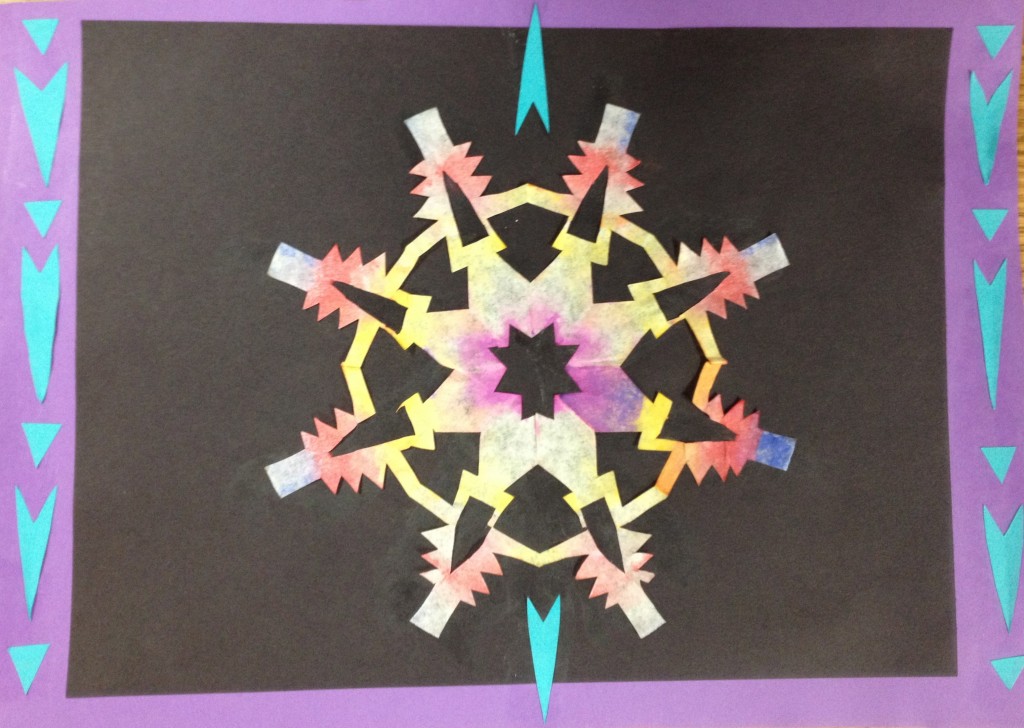 Sixth graders cut and paint coffee filter snowflakes, then use them in a collage. Allow two 40-minute classes.